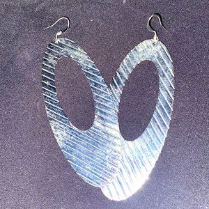 Large silver oval shape earrings